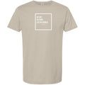 Stow & Roam Beige t-shirt with Get out text on a white background- front